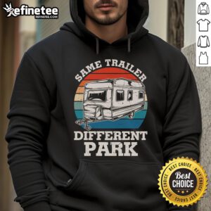 Happy RV camper wearing a vintage hoodie, showcasing the 'Same Trailer, Different Park' theme in a scenic outdoor setting.