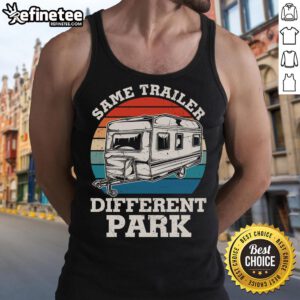 Happy camper wearing a vintage tank top in front of an RV trailer at a park, showcasing a fun outdoor lifestyle.