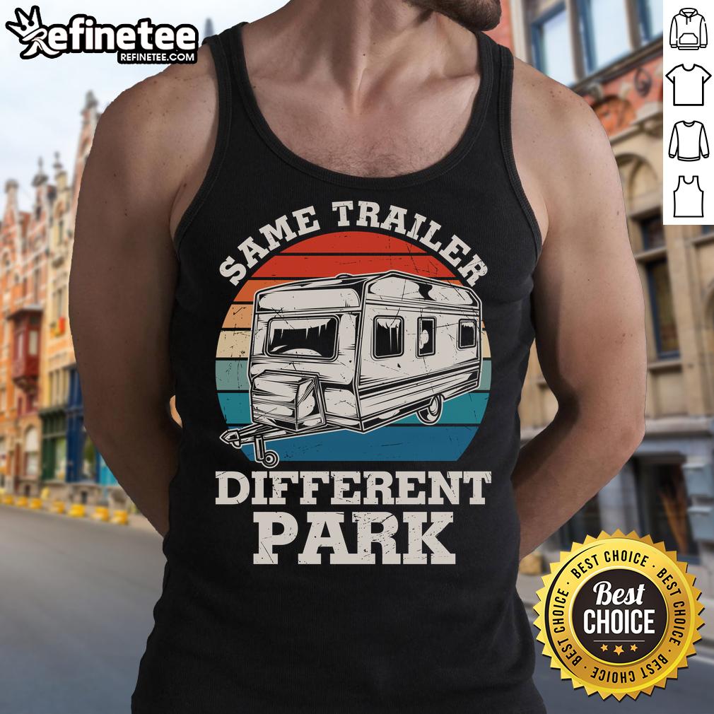 Happy camper wearing a vintage tank top in front of an RV trailer at a park, showcasing a fun outdoor lifestyle.