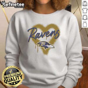 Alt Text: Official Baltimore Ravens Football Spray Heart Sweatshirt featuring a stylish design perfect for fans and game day attire.