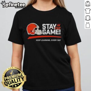 Alt Text: Official Cleveland Browns Stay In The Game Keep Learning Every Day 2025 Ladies Tee featuring team logo and vibrant design.
