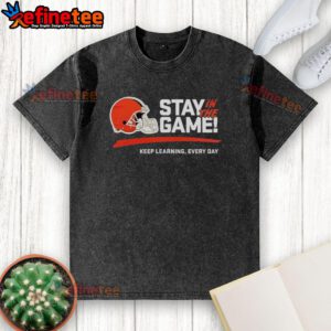 Alt Text: Official Cleveland Browns Stay In The Game Keep Learning Every Day 2025 washed t-shirt, featuring team colors and logo.