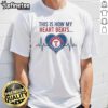 Official This Is How My Heart Beats Texas Rangers T-Shirt featuring team colors and logo, perfect for fans.