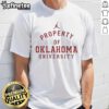 Original Ben Arbuckle Property of Oklahoma University T-Shirt featuring vintage design and school colors.