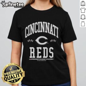 Alt Text: Premium Cincinnati Reds 2025 MLB Speedway Classic Flag Arch Ladies Tee featuring vibrant team colors and stylish design.