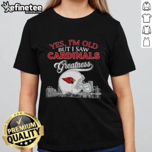 Vintage ladies tee featuring St. Louis Cardinals skyline and helmet design, celebrating team greatness and sports nostalgia.