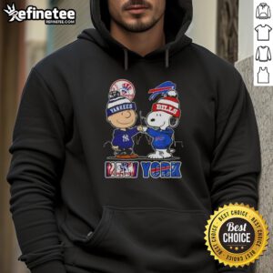 Happy Charlie Brown in a New York Yankees x Snoopy Buffalo Bills skyline hoodie, showcasing a fun and sporty design.