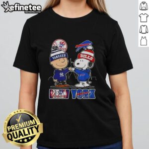 Happy Charlie Brown New York Yankees x Snoopy Buffalo Bills skyline ladies tee featuring iconic sports characters.