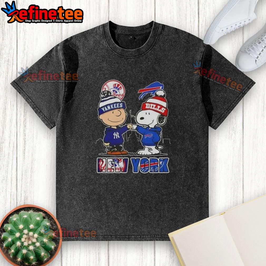 Happy Charlie Brown New York Yankees x Snoopy Buffalo Bills skyline washed t-shirt featuring iconic characters and cityscape.