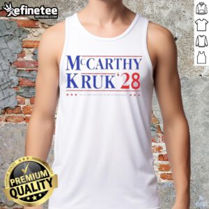 Nice McCarthy and Kruk wearing 'Best Broadcast Team in Baseball' tank tops at a game, showcasing their sports camaraderie.