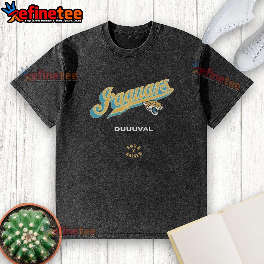 Alt Text: Official Jacksonville Jaguars Born x Raised Duuuval washed T-shirt featuring team colors and logo, perfect for fans.