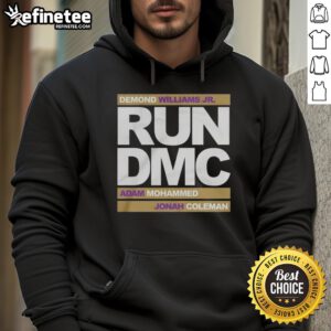 Run DMC hoodie worn by Demond Williams Jr., Adam Mohammed, and Johnah Coleman at official football event.