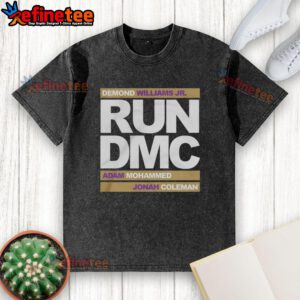 Alt Text: Official Run DMC football t-shirt featuring Demond Williams Jr., Adam Mohammed, and Johnah Coleman in a stylish design.