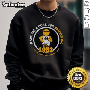 Vintage 1982 Premium Race for a Cure sweatshirt featuring children and African motifs, perfect for collectors and charity supporters.