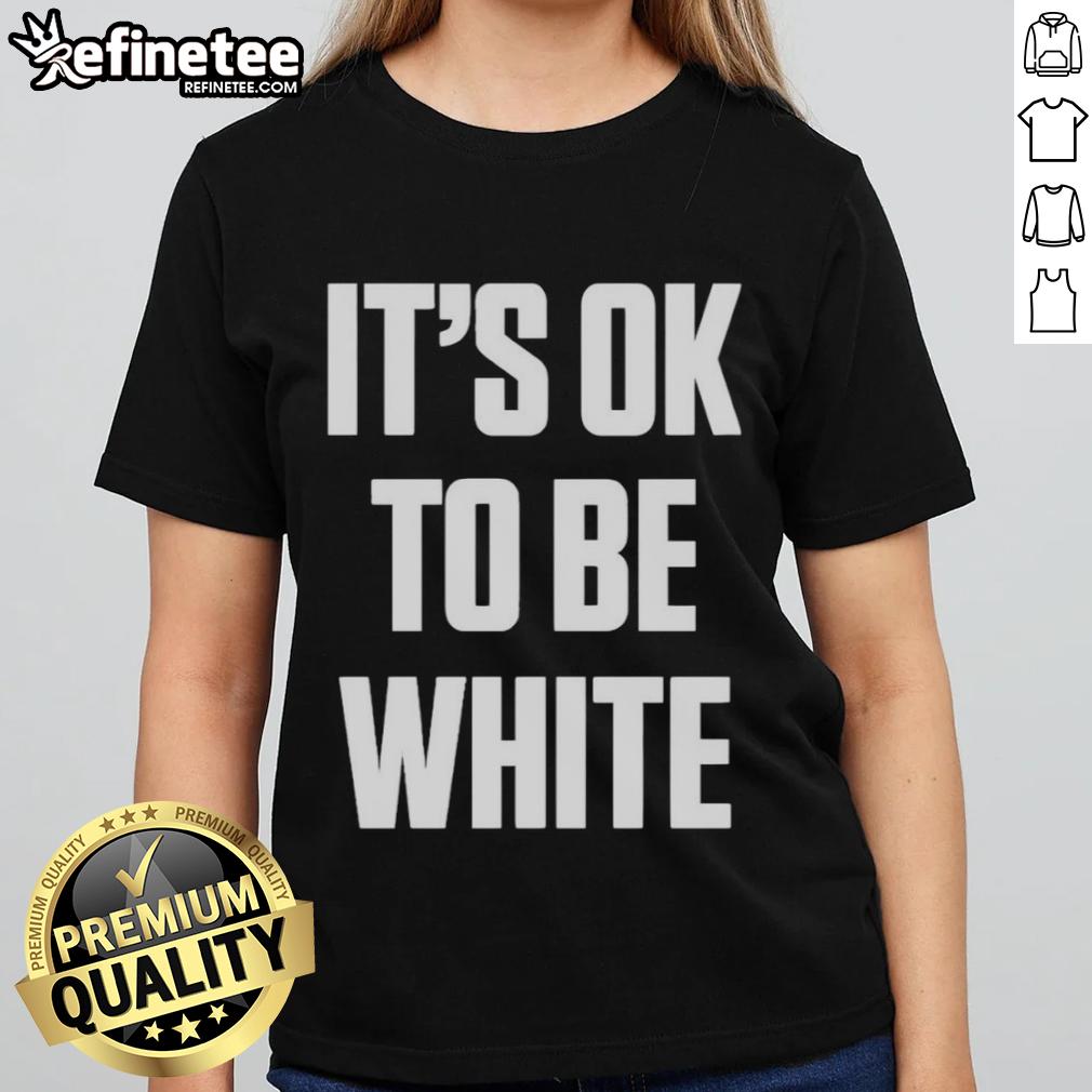 Premium white 'It's OK to be White' ladies tee showcasing a bold message on a stylish shirt design.