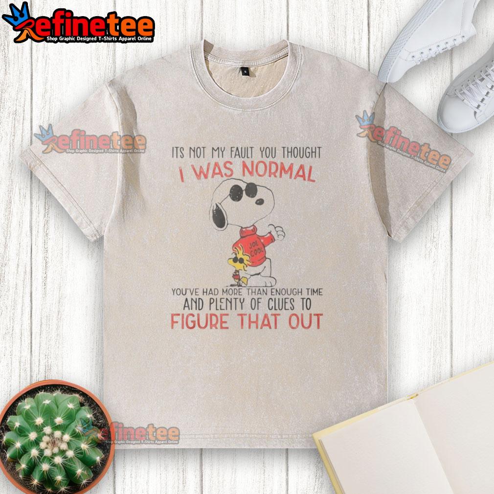 Alt Text: Awesome Snoopy t-shirt featuring the quote 'It's not my fault you thought I was normal' in vibrant colors.