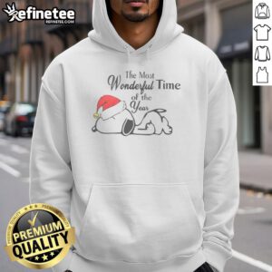 Alt Text: Cute Snoopy in a Christmas hat on a cozy hoodie, celebrating the most wonderful time of the year with festive cheer.