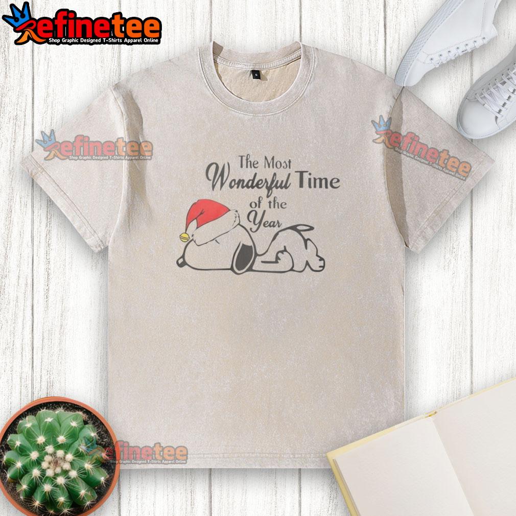 Alt Text: Cute Snoopy wearing a Christmas hat on a washed t-shirt, perfect for celebrating the most wonderful time of the year.