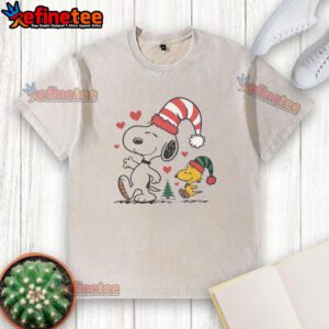 Alt Text: Cute Snoopy and Woodstock Christmas Love design on a washed t-shirt, perfect for holiday celebrations and Peanuts fans.