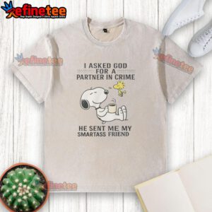 Alt Text: Cute Snoopy and Woodstock graphic on a washed t-shirt, humorously stating I asked for a partner in crime.