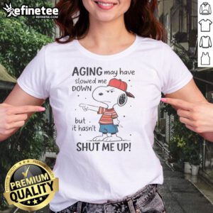 Funny Snoopy aging tee for ladies with playful quote: 'May have slowed me down, but hasnt shut me up.'