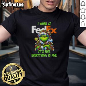 Alt Text: Good Grinch Christmas Tree t-shirt featuring 'I Work At It's Fine Everything Is Fine' design for festive holiday cheer.