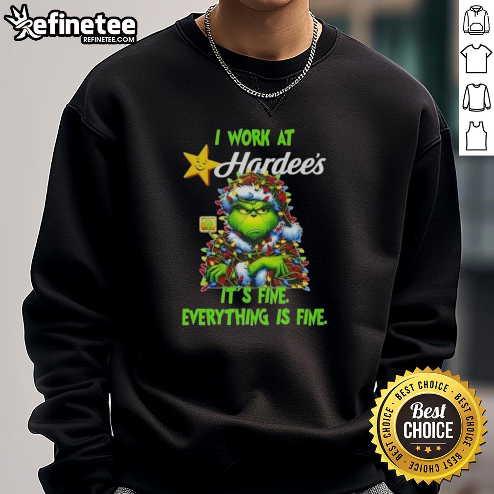 Cozy sweatshirt featuring Good Grinch Christmas Tree X Hardee's design, perfect for festive holiday wear.