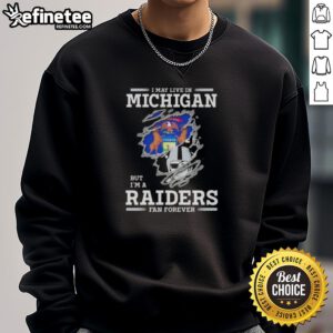 Cozy sweatshirt featuring 'Good I May Live In Michigan But I'm A Raiders Fan Forever' design, perfect for loyal Raiders fans.