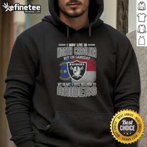 Person wearing a Raiders hoodie, showcasing team spirit in North Carolina on game day, heart and soul with Raiders.