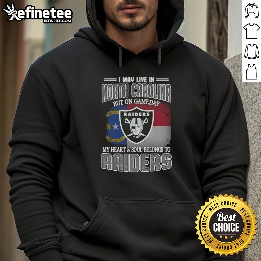 Person wearing a Raiders hoodie, showcasing team spirit in North Carolina on game day, heart and soul with Raiders.