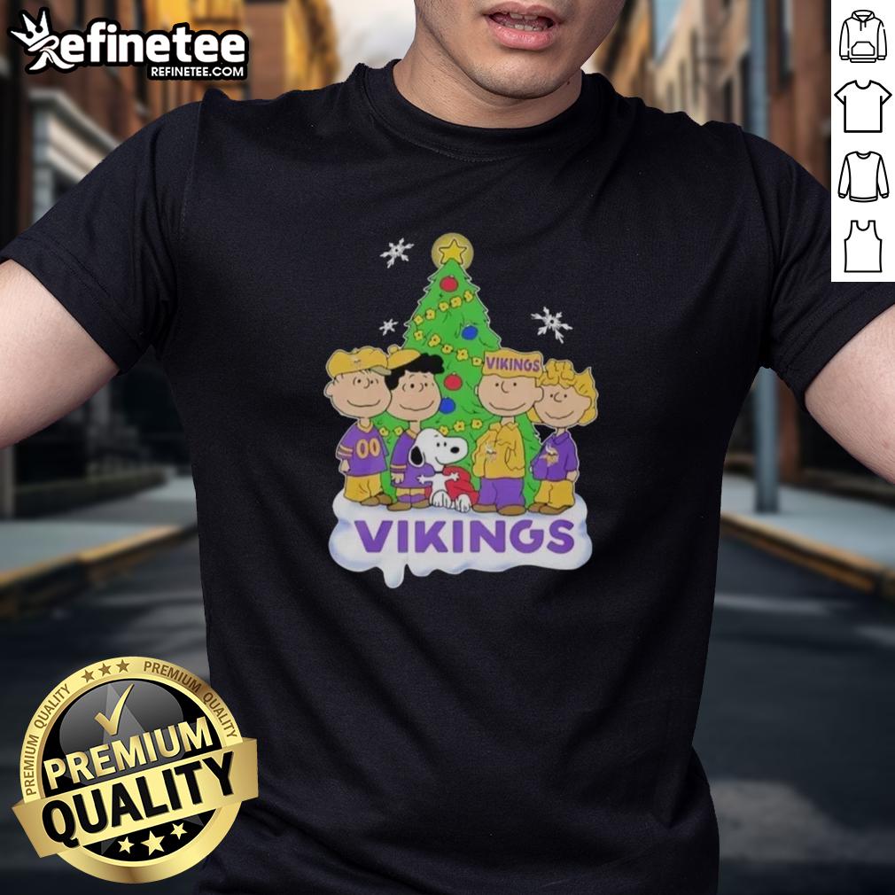 Good Peanuts characters celebrate Christmas in a Minnesota Vikings T-shirt, perfect for festive football fans.