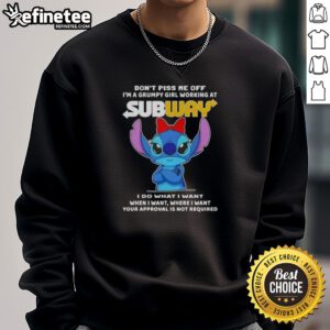 Grumpy girl wearing 'Don't Piss Me Off' sweatshirt at Subway, showcasing a playful attitude and unique style.
