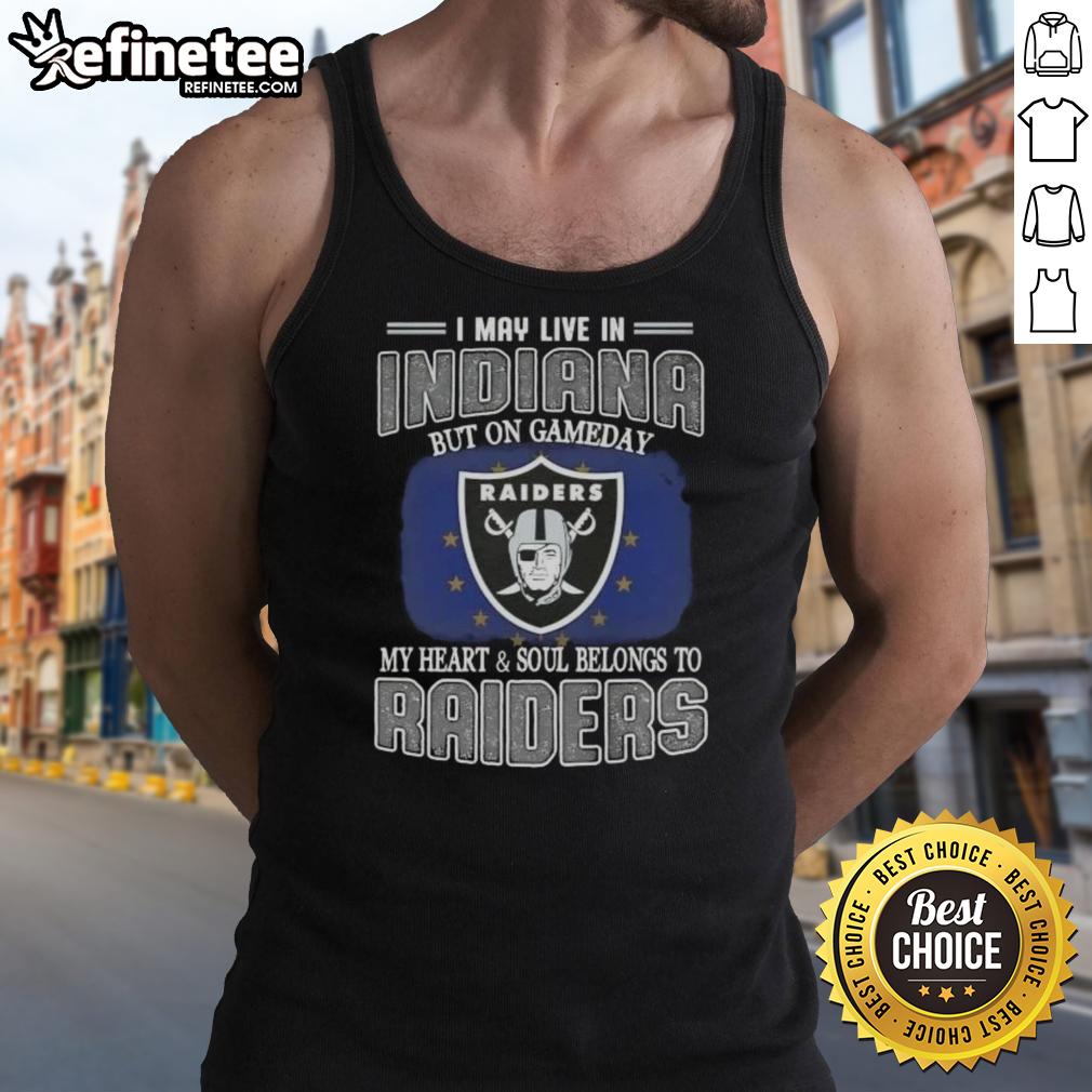 Alt Text: Woman wearing a Raiders tank top, showing team spirit on game day in Indiana, showcasing her love for the Raiders.