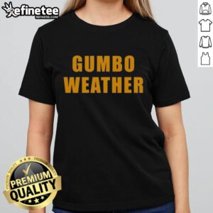 Alt Text: Woman wearing Nice T Bob Hebert Gumbo Weather Ladies Tee, showcasing a stylish design perfect for casual outings.