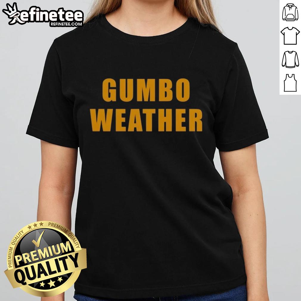 Alt Text: Woman wearing Nice T Bob Hebert Gumbo Weather Ladies Tee, showcasing a stylish design perfect for casual outings.