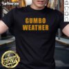 Alt Text: Nice T-Bob Hebert wearing a Gumbo Weather T-Shirt, showcasing vibrant design and casual style.