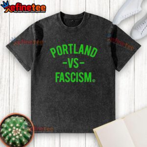 Official Portland Vs Fascism and ICE washed t-shirt featuring a bold graphic design promoting social justice.