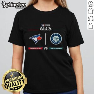 Official Toronto Blue Jays vs Seattle Mariners 2025 ALCS Matchup MLB Postseason Game Day Ladies Tee displayed on a hanger.
