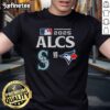 Official Toronto Blue Jays vs Seattle Mariners 2025 ALCS Baseball matchup T-Shirt featuring team logos and vibrant design.