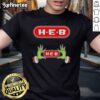 Original Grinch Hands Love H-E-B Christmas T-Shirt featuring whimsical Grinch design for festive holiday spirit.