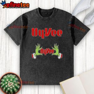 Original Grinch Hands Love Hy-Vee Christmas washed t-shirt featuring festive green design for holiday cheer.