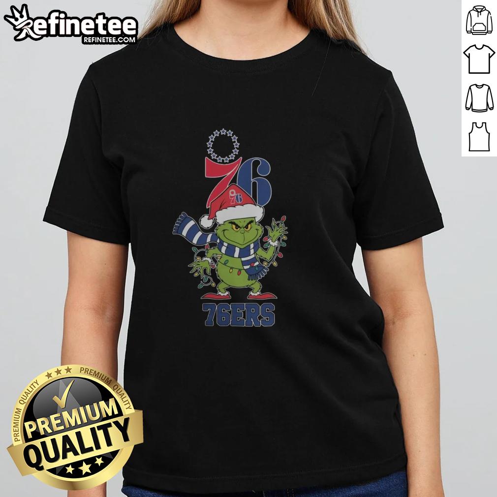 Original Philadelphia 76ers Christmas Grinch Santa Hat Holiday 2025 Ladies Tee featuring festive design and team logo.