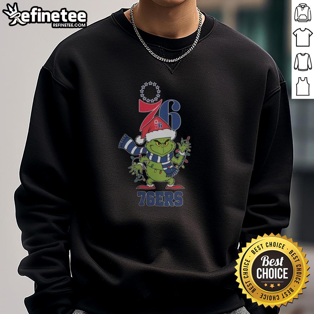 Original Philadelphia 76ers Christmas Grinch Santa Hat Holiday 2025 Sweatshirt featuring festive design and team logo.