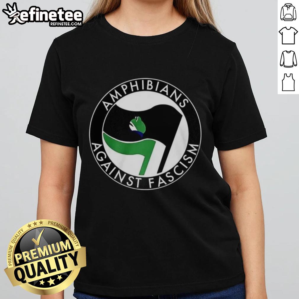 Premium Amphibians Against Fascism Frog Flag Ladies Tee showcasing a vibrant frog graphic on a stylish shirt.