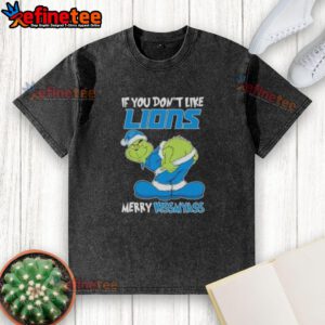 Premium Grinch 'If You Don't Like Detroit Lions, Merry Kiss My Ass' washed t-shirt for passionate NFL fans.