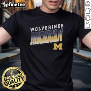 Premium Michigan Wolverines polished t-shirt featuring vibrant colors and official logo for fans and alumni.