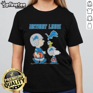 Premium Peanuts Snoopy and Charlie Brown Detroit Lions football ladies tee in vibrant colors, perfect for fans.