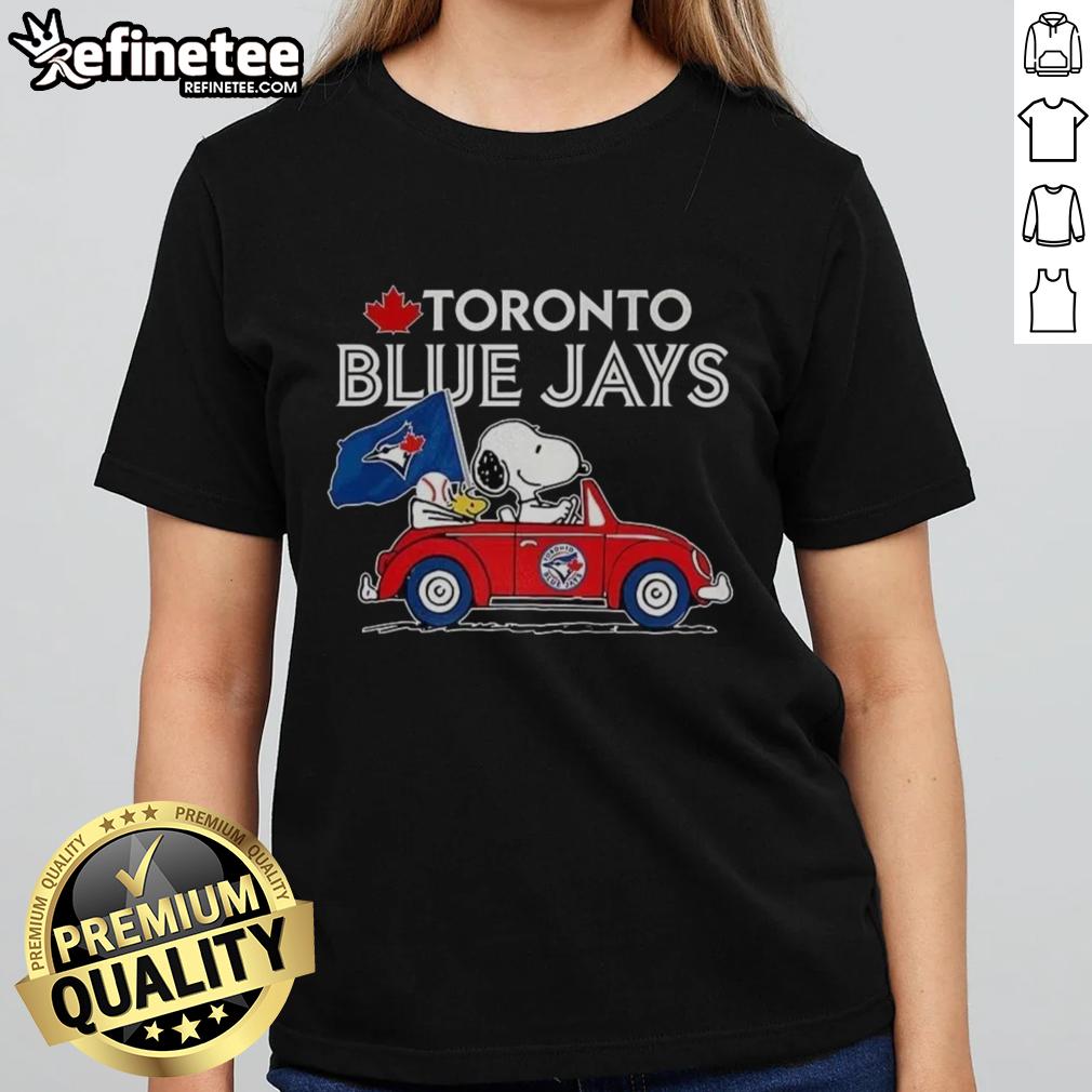 Premium Snoopy and Woodstock on Volkswagen Beetle tee for Toronto Blue Jays baseball fans, perfect ladies' shirt.