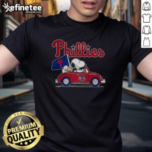Premium Snoopy and Woodstock X Philadelphia Phillies baseball fans t-shirt featuring vibrant graphics and team colors.