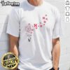 Pretty dandelion flower design on Nebraska Huskers football logo T-shirt, perfect for fans and floral enthusiasts.